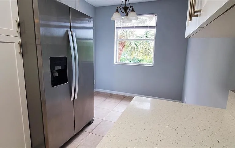 9033 Wiles Rd — Photo 11
