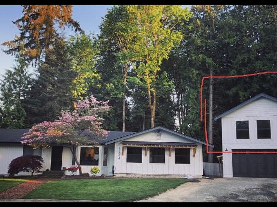 Unit is above the garage circled in red. Property owners live in rambler. Garage not included for renter.