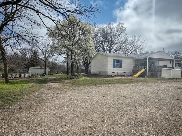 9210 NE Highway Hh, Lowry City, MO 64763