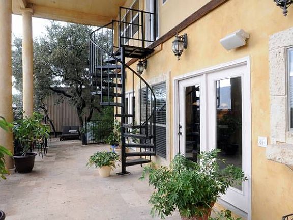 Patio between house/pool