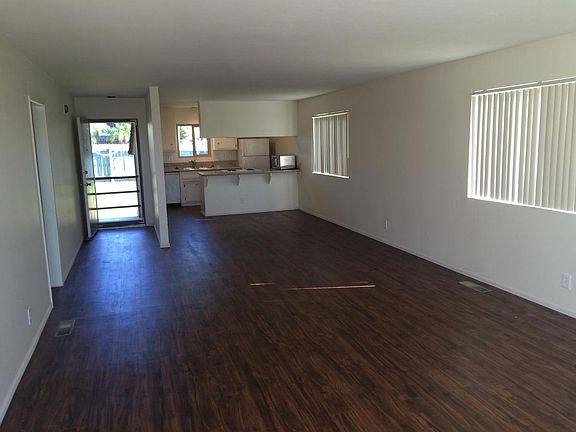 View of Front Entry, Dining Room and Kitchen from Living room area