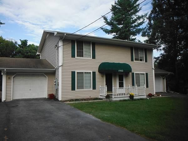 This is the front of the duplex. Someday I'm going to remember to take a picture of the front when the summer flowers and hosta are blooming the in the flower beds.