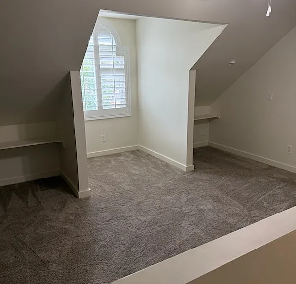 Loft bedroom or another office area for tenant overlooks the back yard