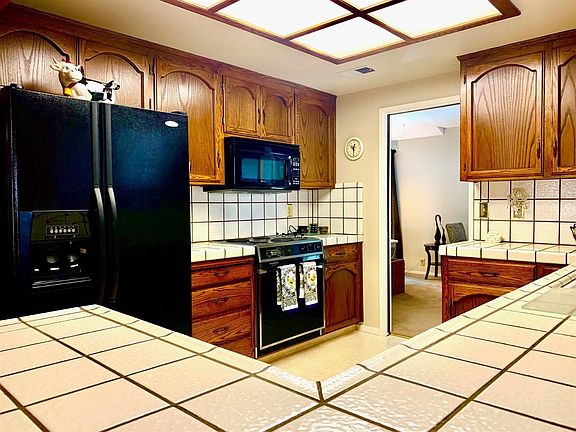 Convenient kitchen with everything in your reach. Refrigerator included in sales price.
