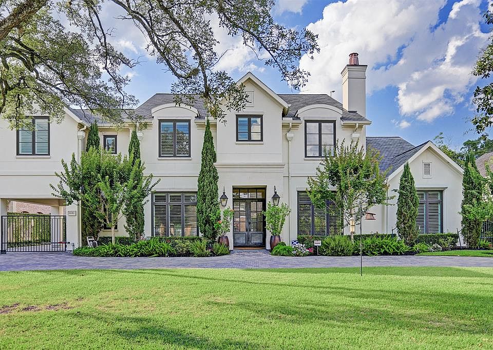 ABSOLUTELY FABULOUS!!! This stunning 5 bedroom French Contemporary Custom Home built by Croix Builders in desirable Tanglewood is presented by Moira Holden of BHGRE Gary Greene Realtors