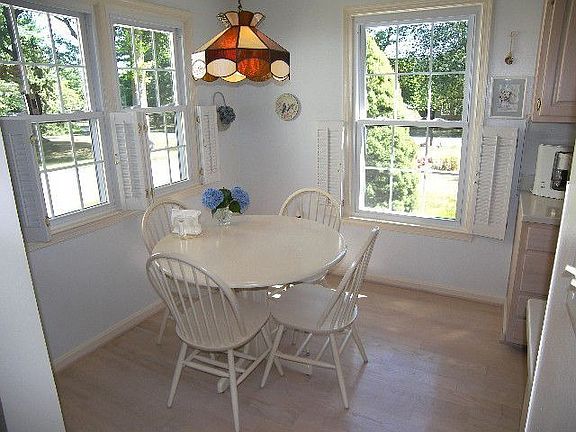 Sunny Eat-in Area with wood floor.