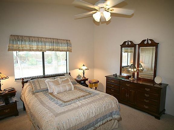 Master bedroom with two closets including a large walk-in