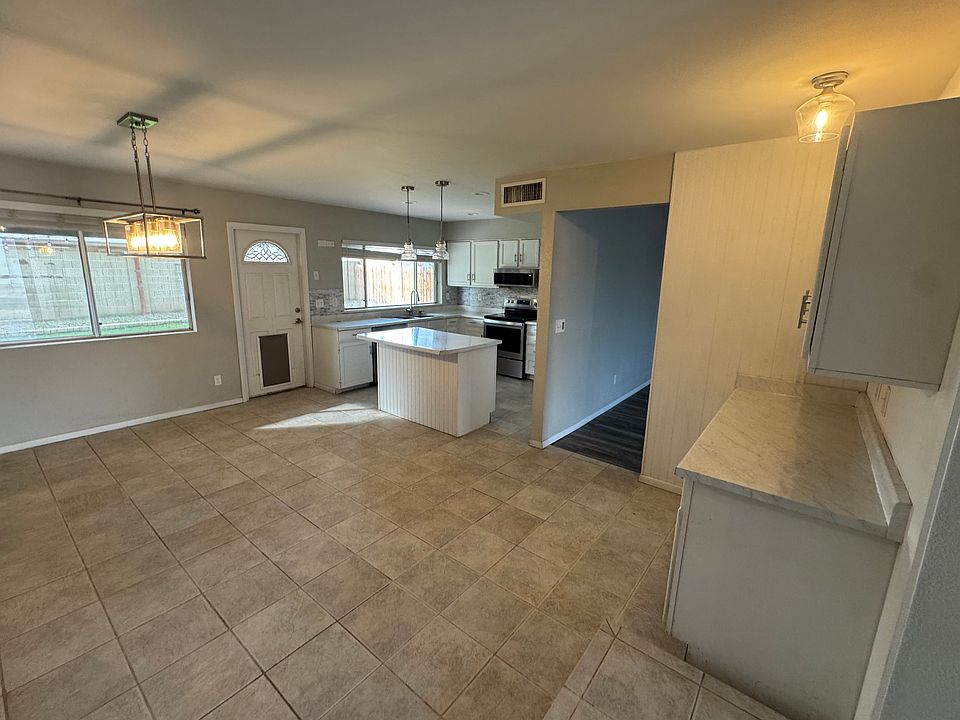 Entry way leading into kitchen, dining room, with coffee bar addition.