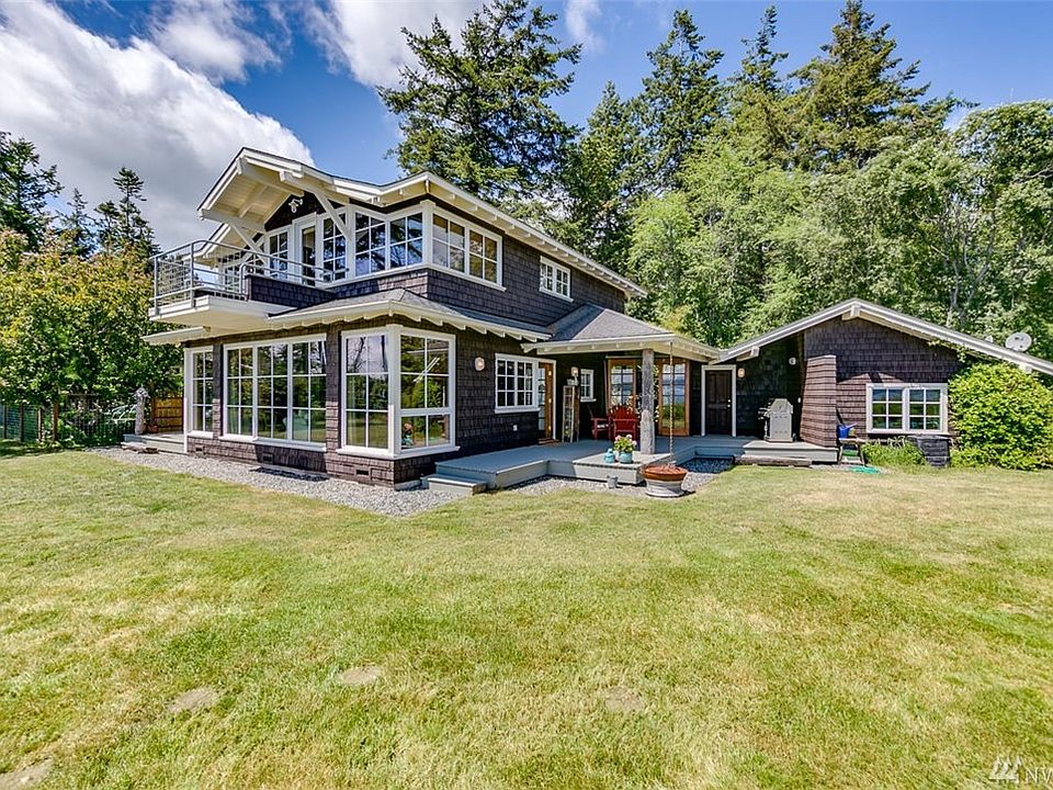 Classic craftsman beach house designed and built to evoke impression of a historic home.