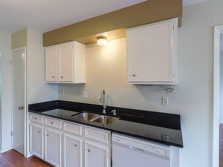 Plenty of kitchen cabinets, and pantry.