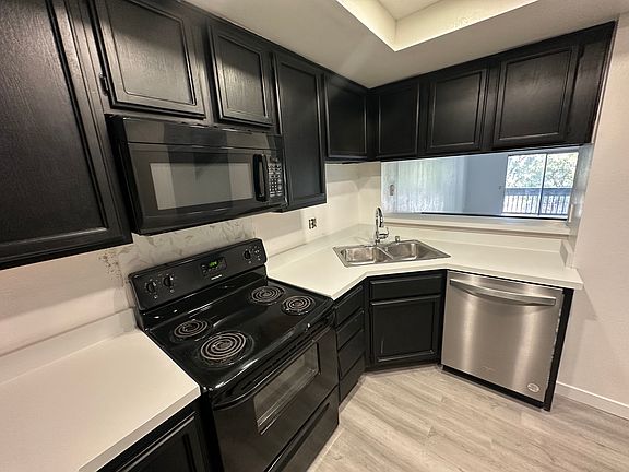 Kitchen with new Fridge and dishwasher