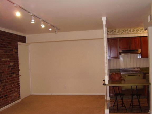Dining Area & Galley Kitchen to right
