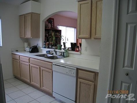 Kitchen has great neutral colors & ceramic tile