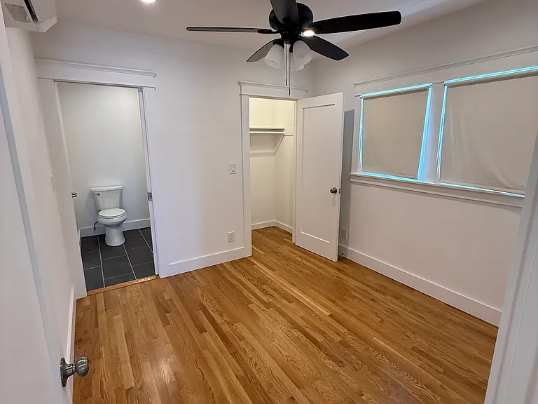 BEDROOM 1 WITH DIRECT ACCESS TO BATHROOM AND LARGE CLOSET