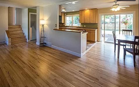 View from living room to kitchen and dining area.