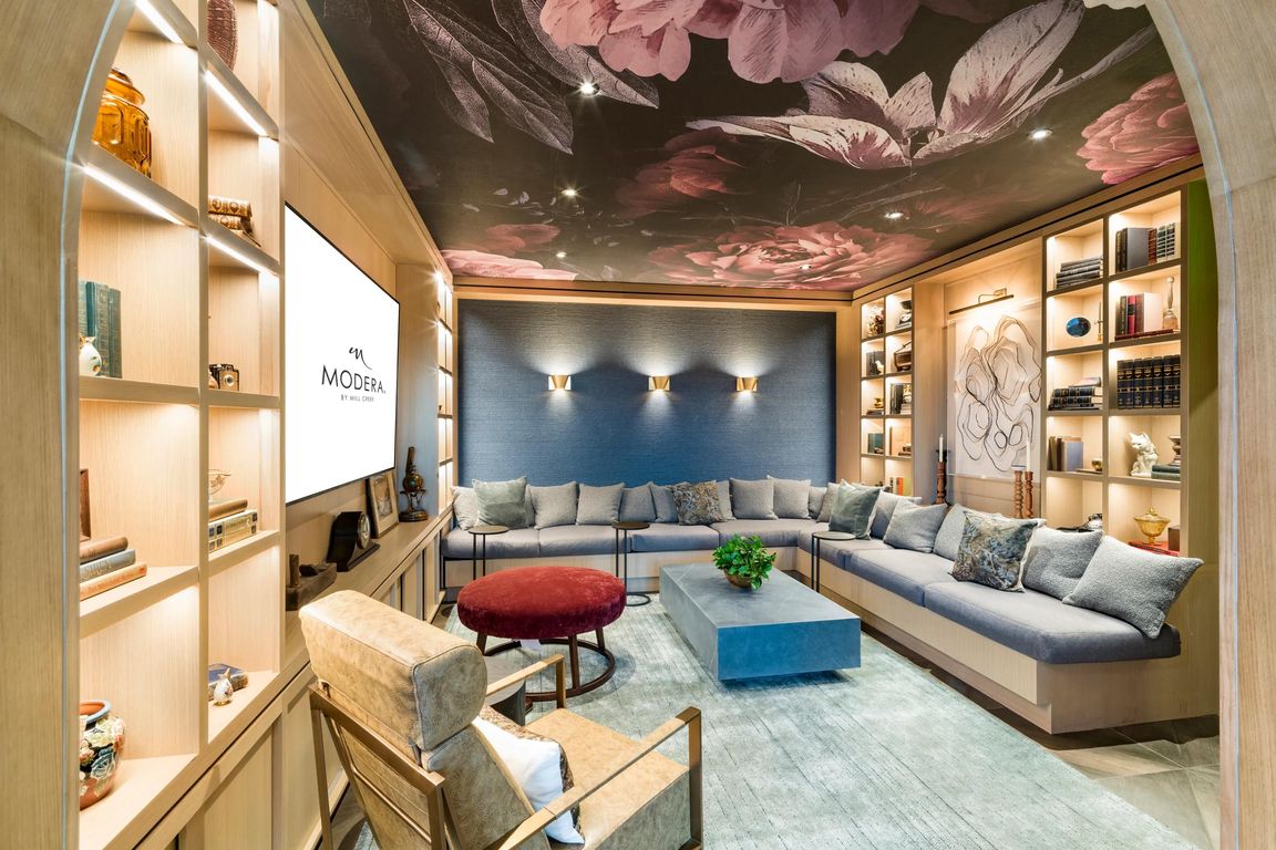 An artfully designed resident lounge at Modera University Park, offering a refined place to unwind just minutes from the heart of University Park.