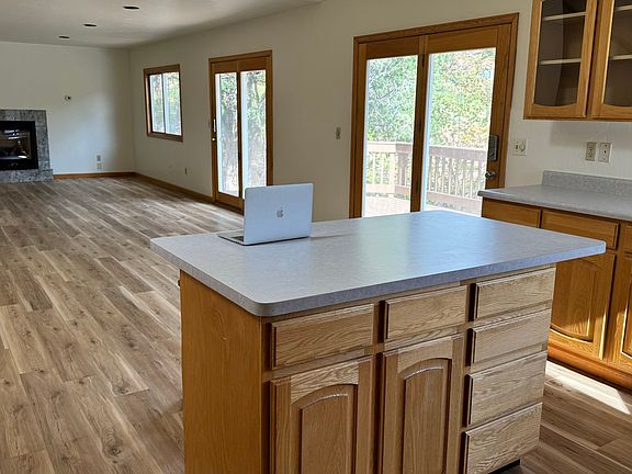 Kitchen Island Opens to Expansive Living Room