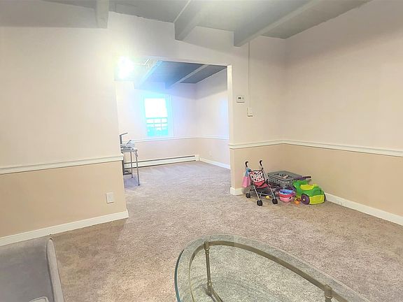 Living room opens to Dining room