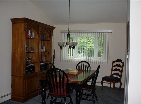 FORMAL DINING RM CARPET OVER HARDWOOD