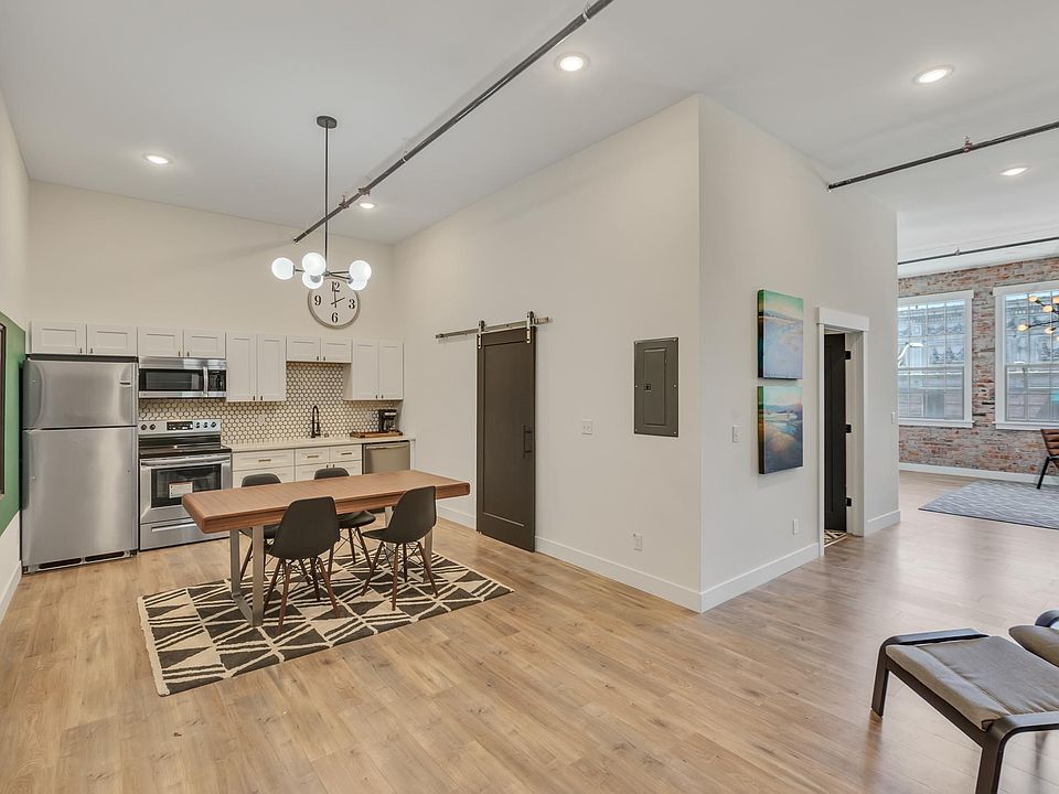 Open floor plan- kitchen is open to living around a wide hall
