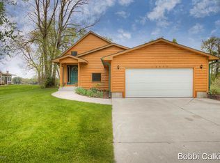12590 Point Dr NE, Gowen, MI 49326