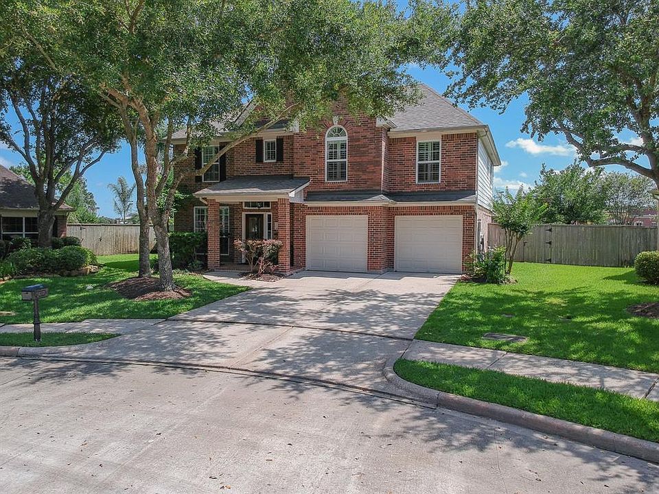 Lovely 2 story brick home with established trees in cul-de-sac.