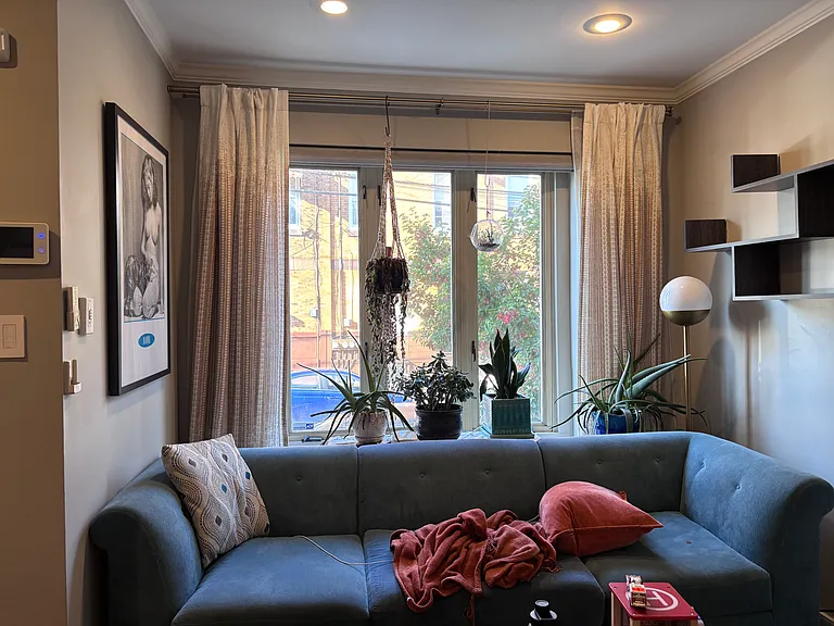 Front Window with included Power Blinds(via wall remote)