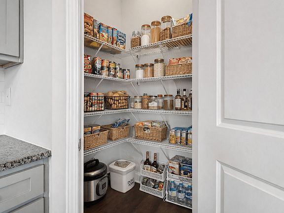 Spacious pantry to accommodate all your storage needs.