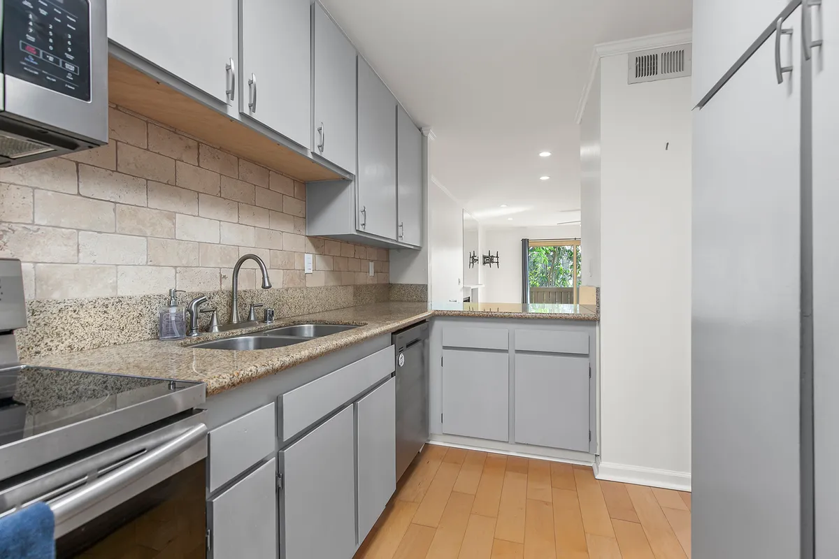 Kitchen. Upgraded Stainless Steel appliances. - 5700 Baltimore Dr #174