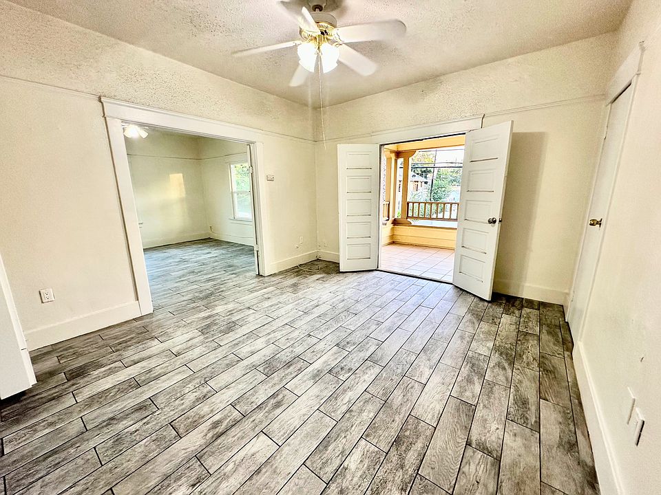 HUGE living room with double door entry to big bedroom #2 and double door entry to the spacious balcony.