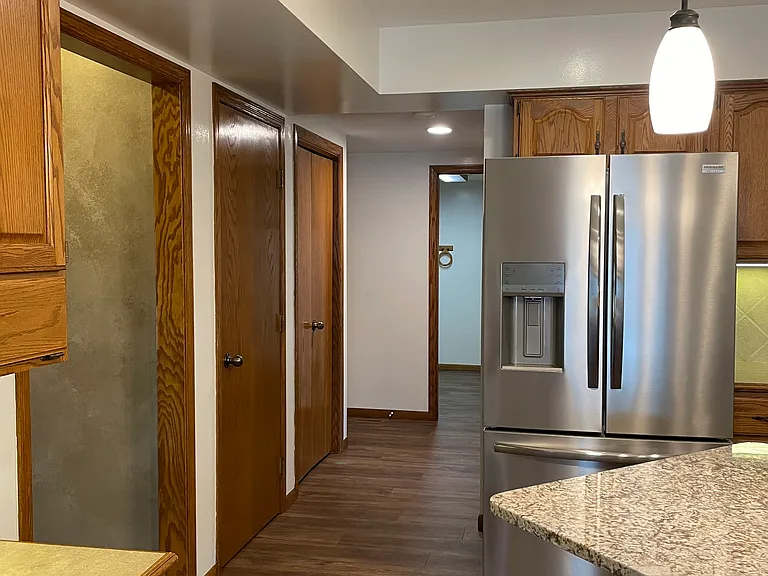 Kitchen with new refrigerator with dual ice makers