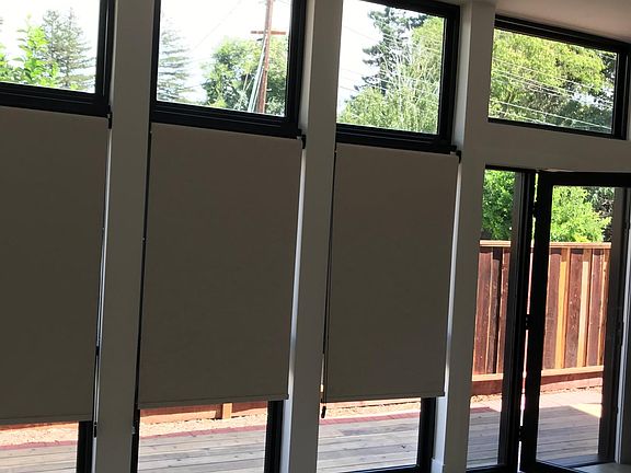 Tall windows. High ceilings ADU. Entry door to the Front deck.