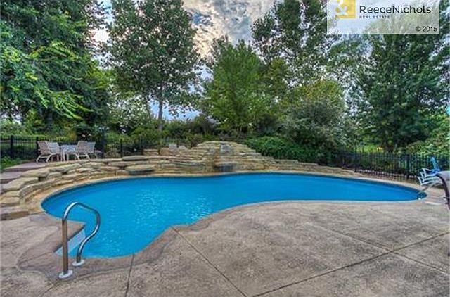 Gorgeous Kidney Shaped Pool with Entertaining Tiers & Waterfalls