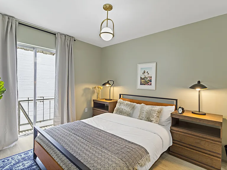 Bedroom 4 with small balcony