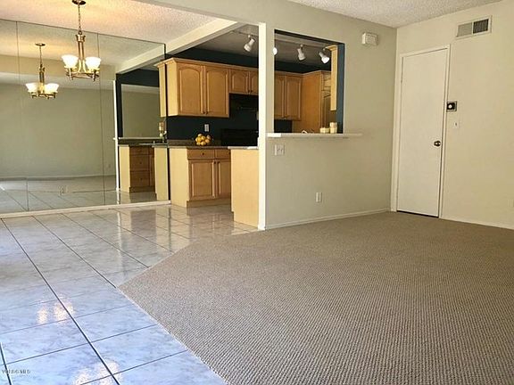 Kitchen opens to living area
