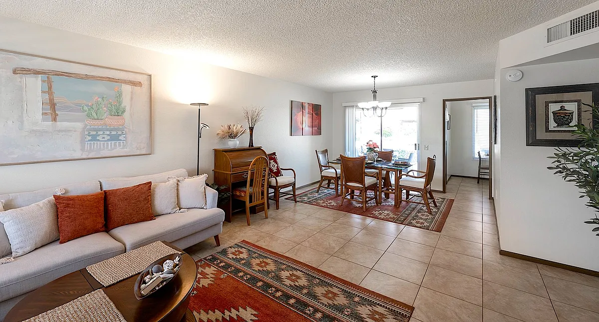 Solid wood coffee table includes lift-up eating trays. - 12414 W Nugget Ct