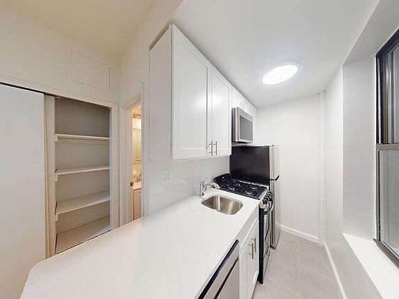 5th image of 417 E 65th St APT 11