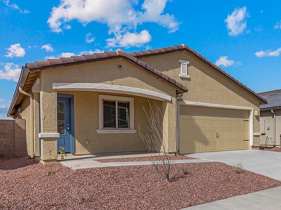 Angled exterior of the Taos with a covered front porch.