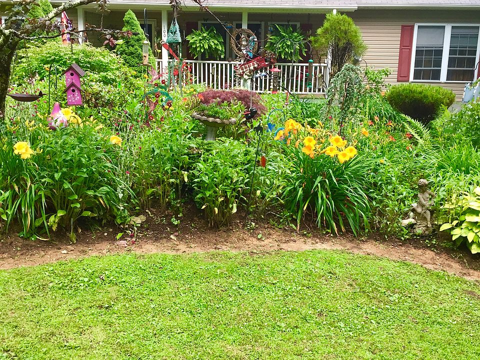 Front of house with flowers