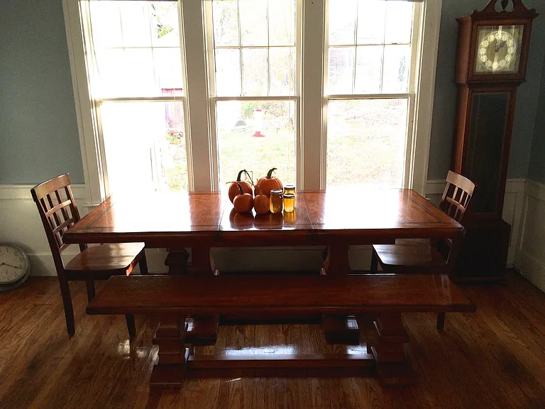 Spacious Dining Room with Hardwood Floors & Garden Views