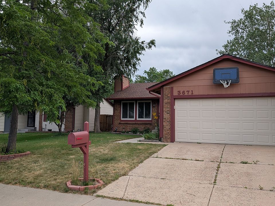 Front of house. North-facing front yard with detached garage.