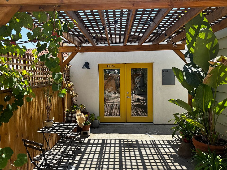 Private space to relax under the grapevines.
