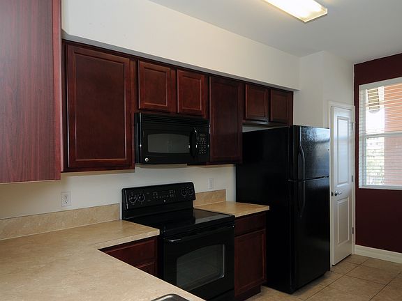 Kitchen with microwave, stove, frig and dishwasher