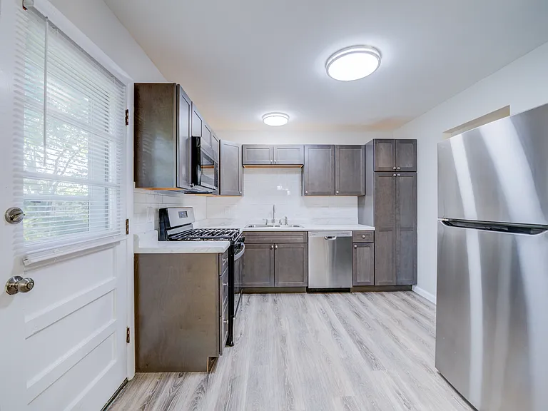 Fully rehabbed kitchen with all new cabinets, counter-tops, backsplash, appliances - everything!!