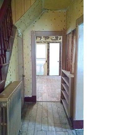 Entry hallway towards kitchen