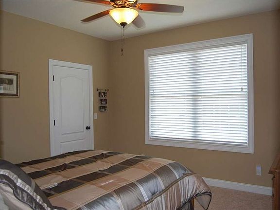 "Three additional bedrooms are located at the opposite end from the MBR for privacy"
