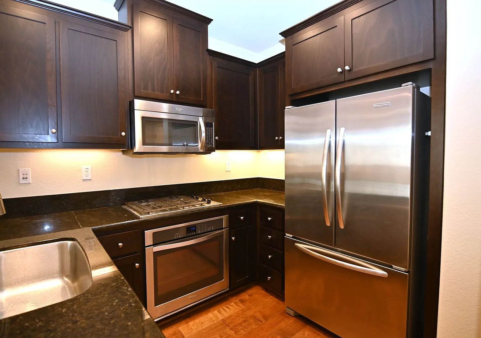 Sleek Tri-Level Townhome with Modern Upgrades and Top Ammenities - Tralee Village — Photo 3