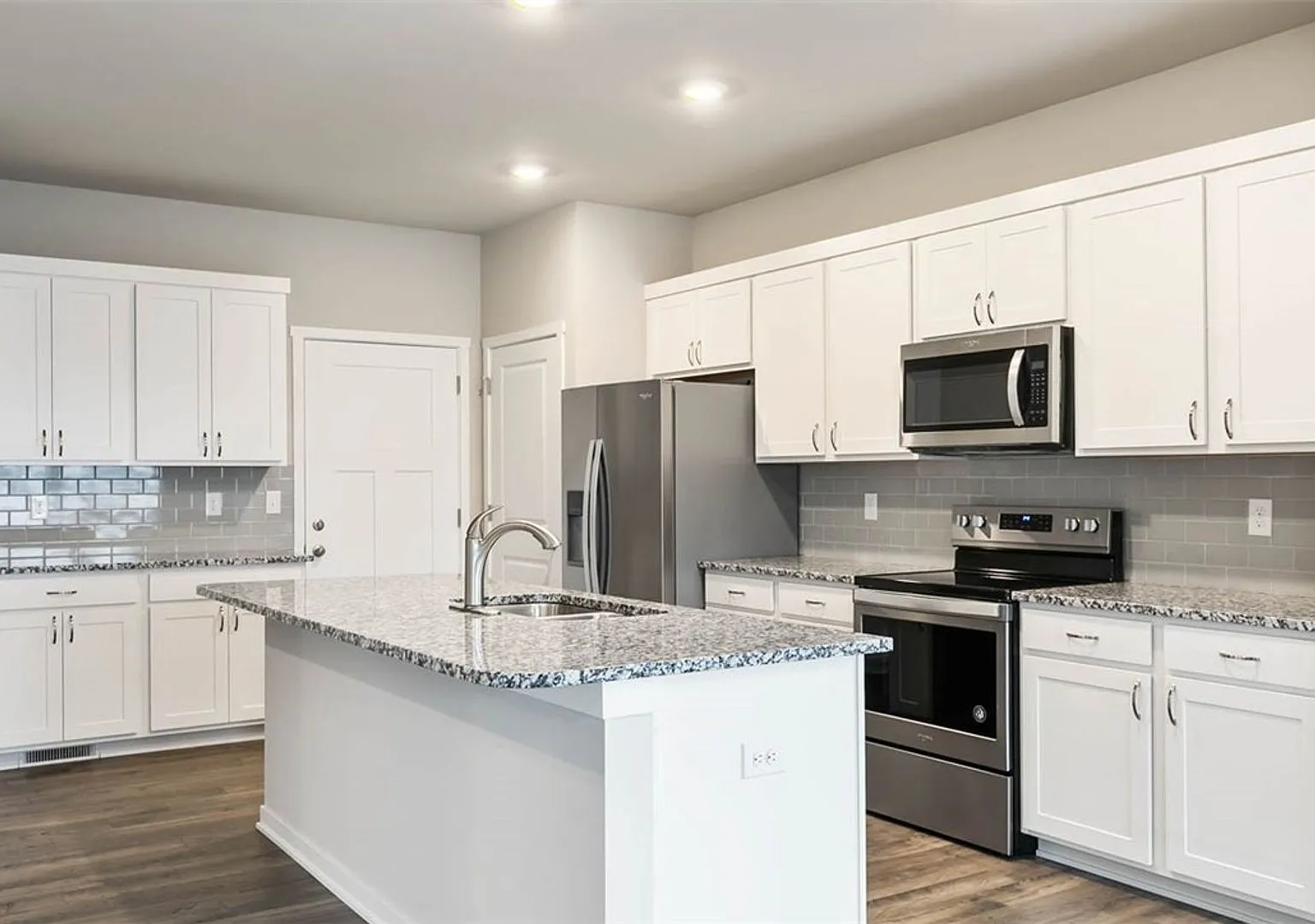 Modern 4-Bedroom Home in Prairie Trail | 2408 SW Plaza Parkway — Photo 2