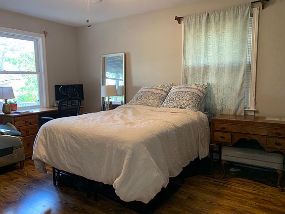 Large Bedroom. Enough space for Queen or King Bed. With a queen, can fit two desks, and dresser in the room. Huge closet.