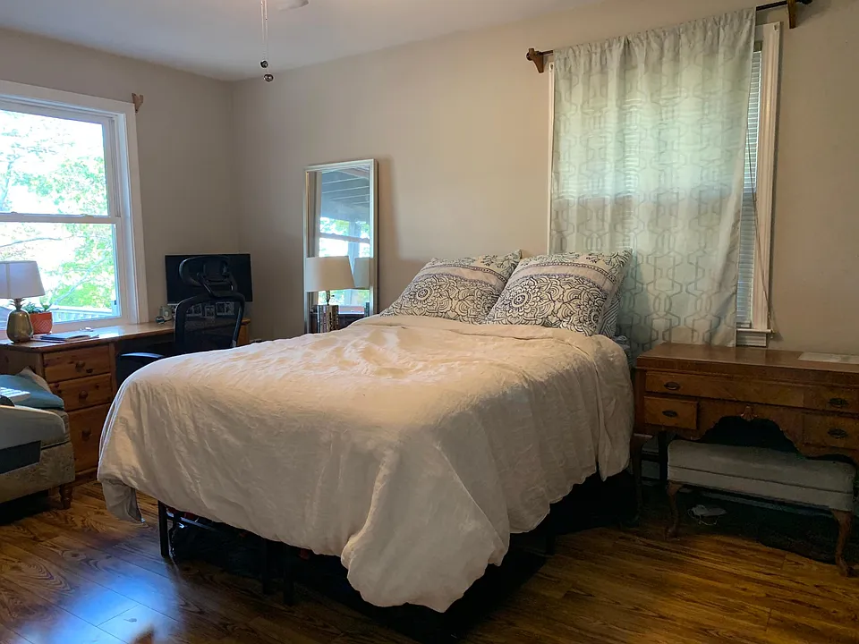 Large Bedroom. Enough space for Queen or King Bed. With a queen, can fit two desks, and dresser in the room. Huge closet.